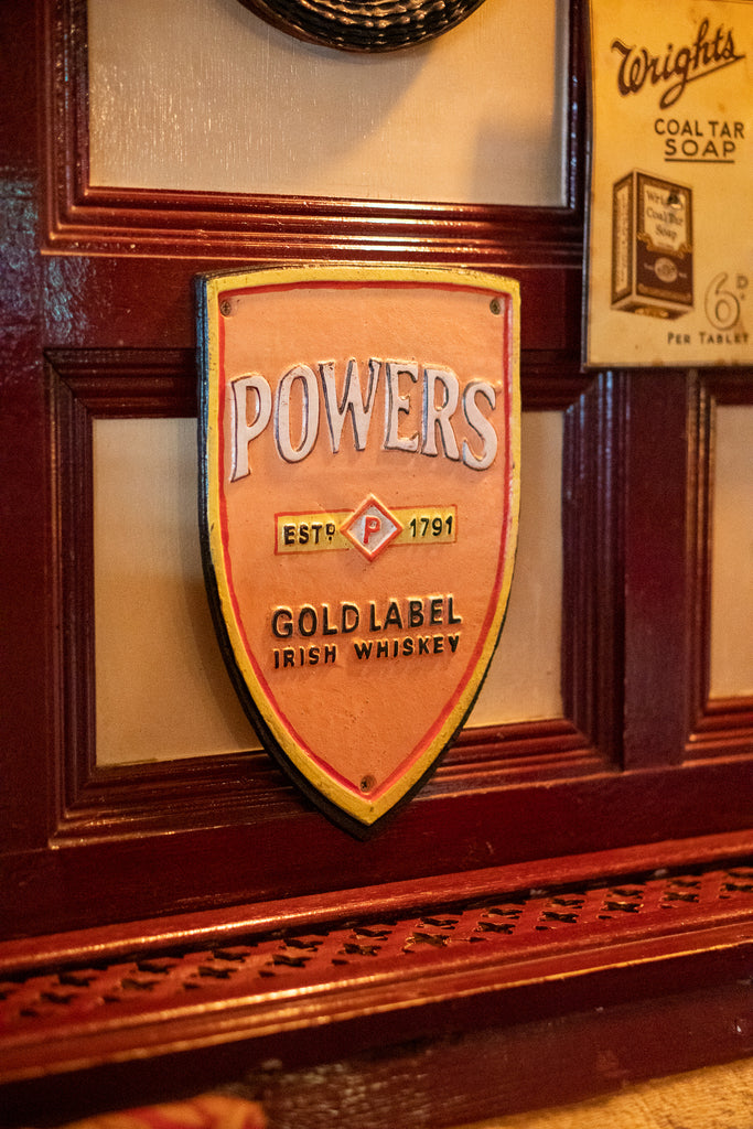 Powers Cast Iron Sign